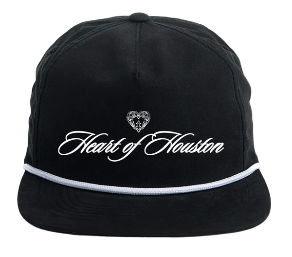 Black cap with 'Heart of Houston' text and heart design on a white background