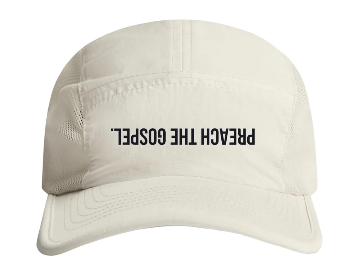 Beige cap with 'PREACH THE GOSPEL' text on a white background
