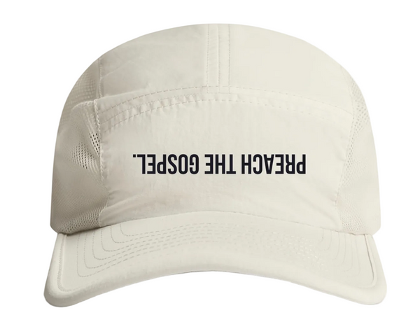 Beige cap with 'PREACH THE GOSPEL' text on a white background